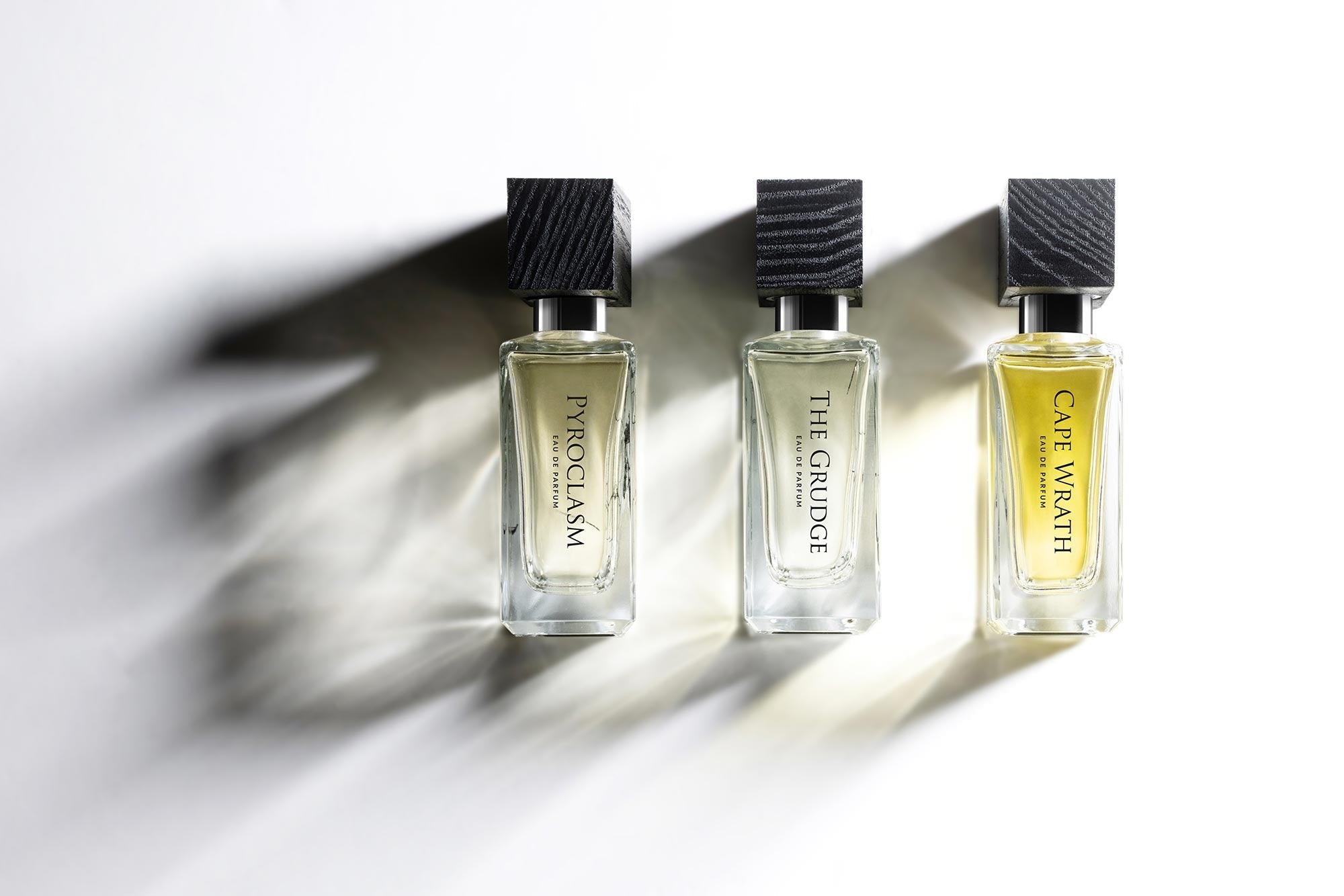 Beaufort London's 'Force Majeure' Eau de Parfum collection on a white background with bold shadows