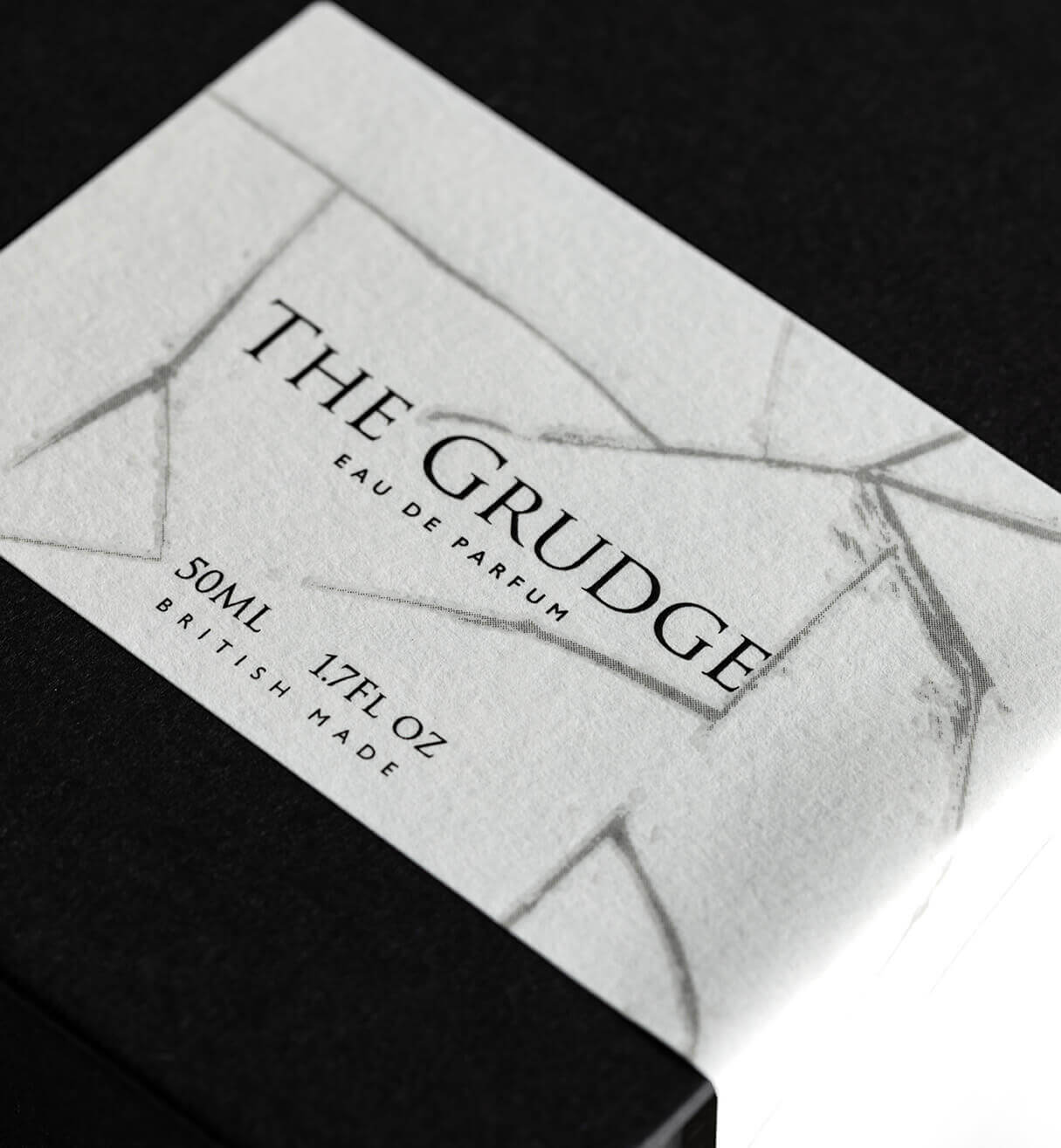 A bottle of BeauFort London's The Grudge Eau De Parfum, detailing the intricate label