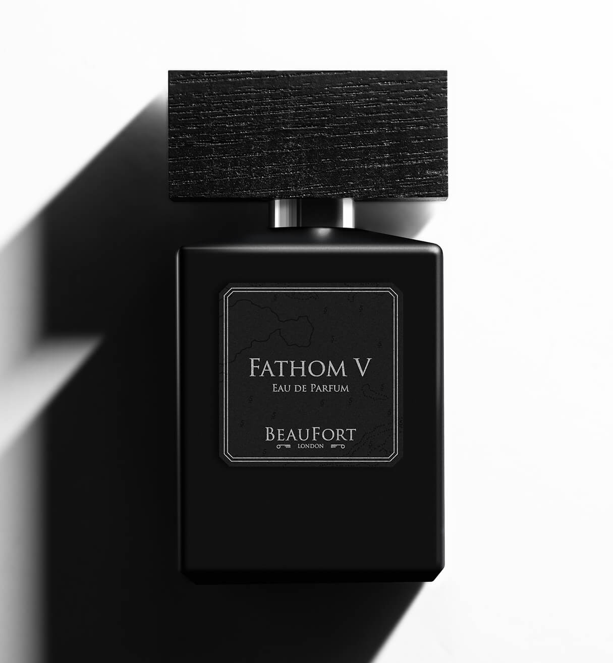 A bottle of Beaufort London's  'Fathom V' Eau de Parfum bottle on a white background with heavy shadows