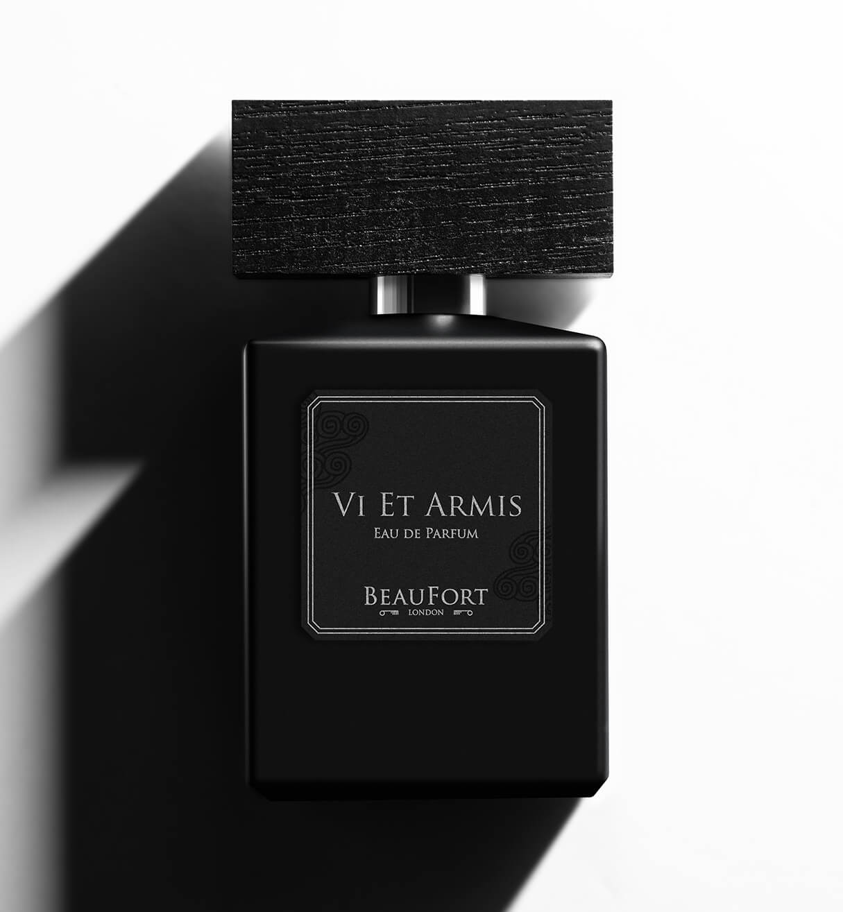 A bottle of Beaufort London's 'Vi Et Armis' Eau de Parfum bottle on a white background with heavy shadow